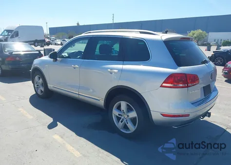 2012 Volkswagen Touareg Hybrid from USA, damaged, VIN WVGEG9BP4CD010507